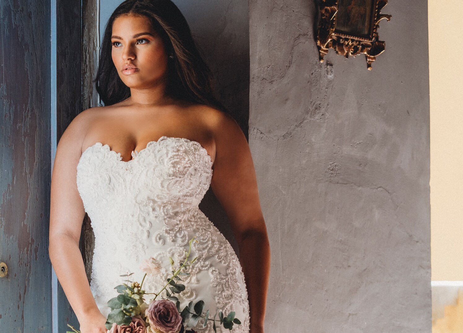 Brunette plus size bride in a white gown