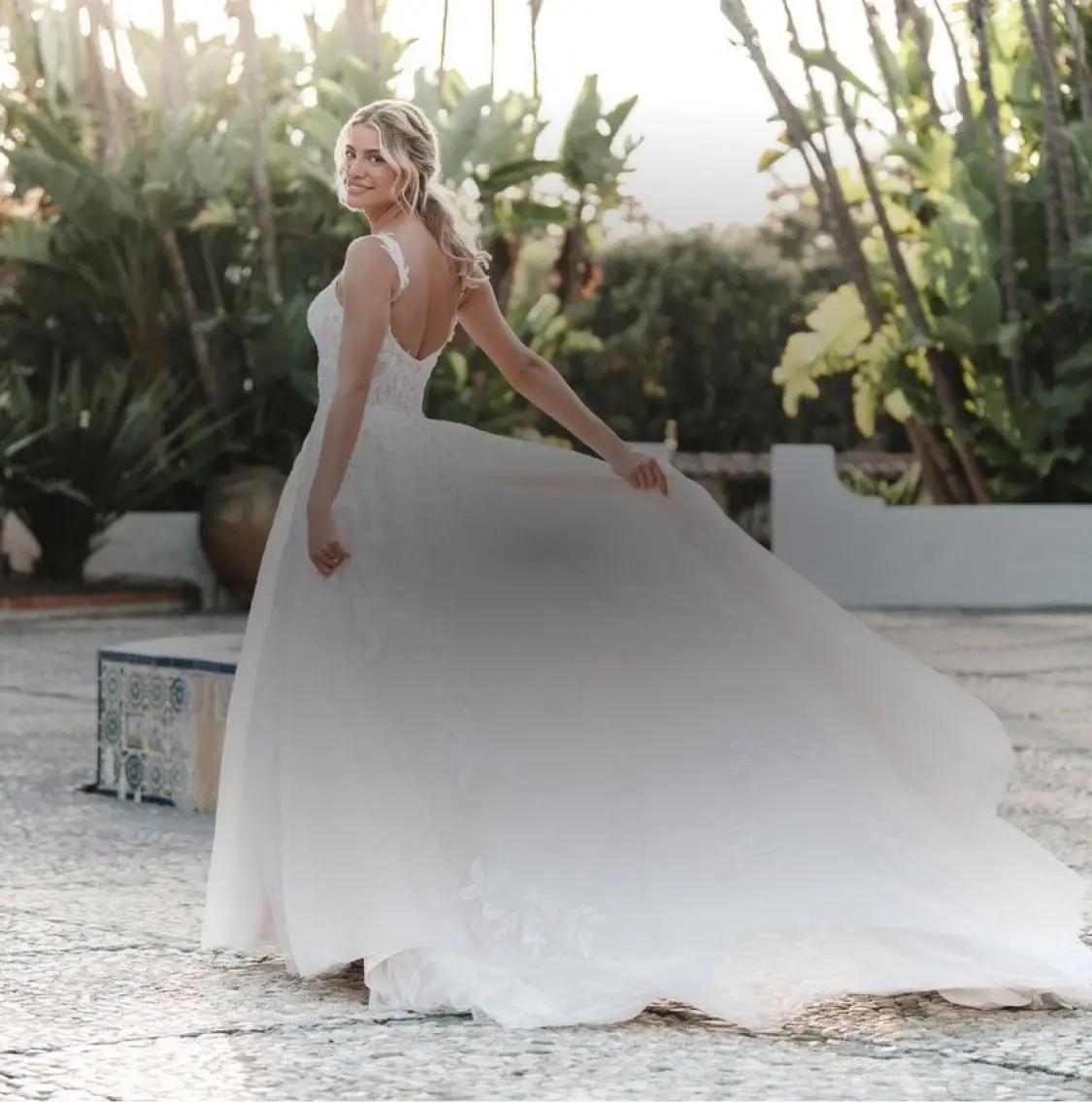 Brunette in an exclusive bridal dress