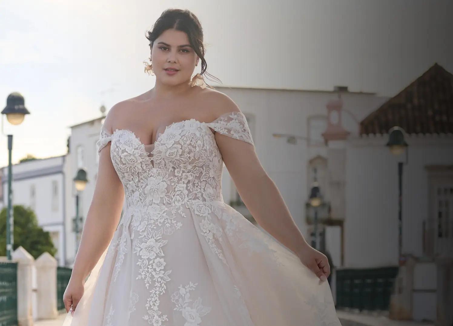 Brunette plus size bride in a white gown